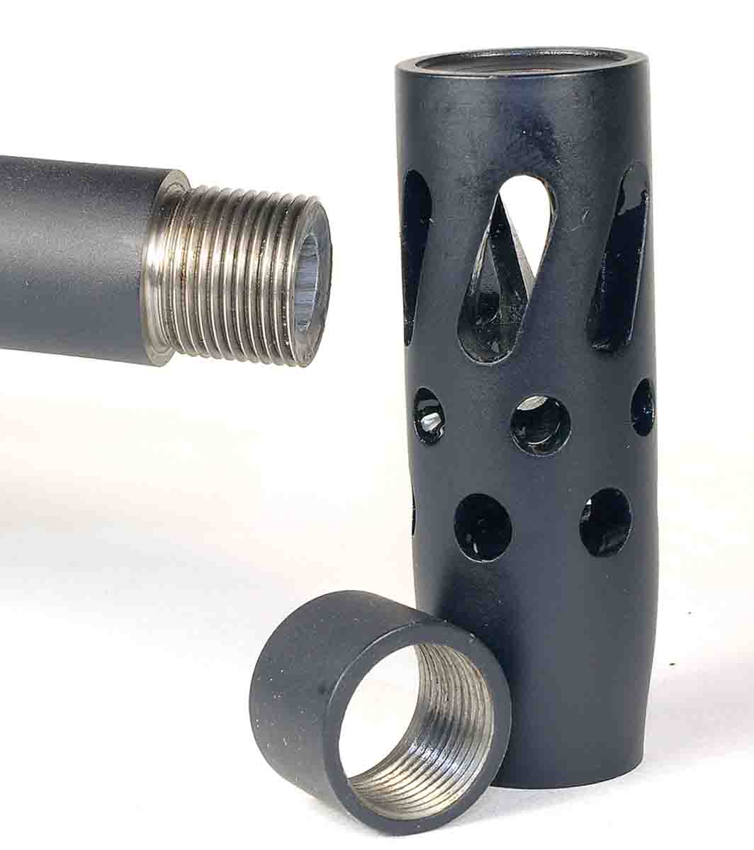 The rifle came with an optional muzzle brake; a cap hides and protects the threads on the muzzle when the brake is removed.